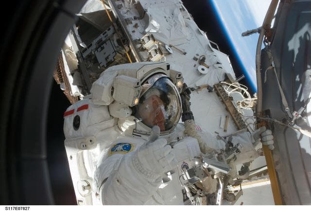 NASA image: Forrester moves to the Quest A/L during Extravehicular Activity 4