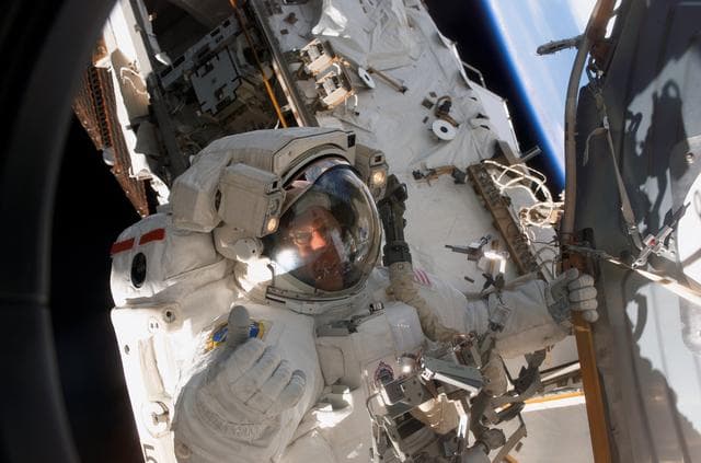 NASA image: Forrester moves to the Quest A/L during Extravehicular Activity 4