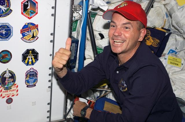 NASA image: Sturckow gives the thumbs up in the Node 1