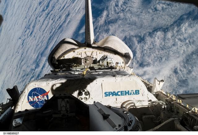 NASA image: View of Endeavours Payload Bay and Vertical Stabilizer taken during STS-118