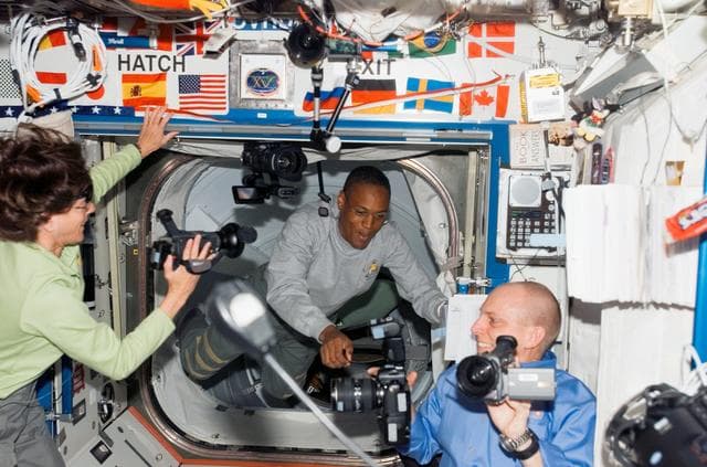 NASA image: STS-118/Expedition 15 Crewmembers greet one another after Hatch Opening