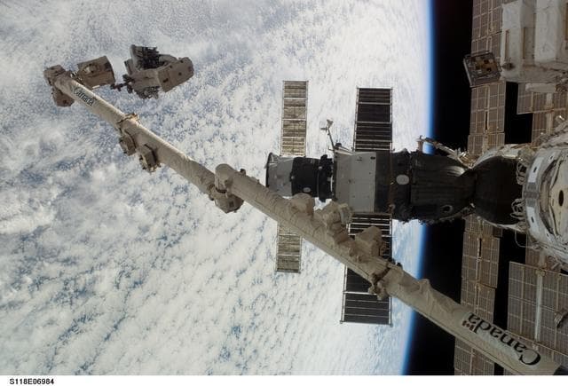 NASA image: View of MS Williams transporting the new CMG during EVA 2