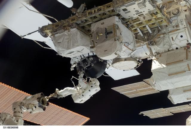 NASA image: View of MS Williams transporting the new CMG during EVA 2