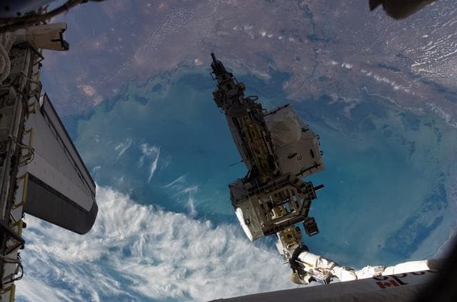 NASA image: View of the ESP 3 as its being transferred to the P3 Truss for Installation