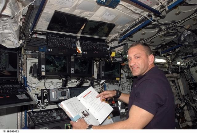 NASA image: Hobaugh works the SSRMS in the US Lab during STS-118/Expedition 15 Joint Operations