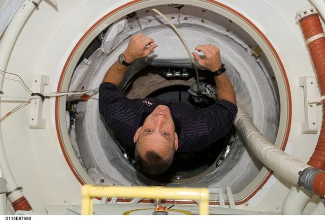 NASA image: Hobaugh posing for a photo during STS-118/Expedition 15 Joint Operations