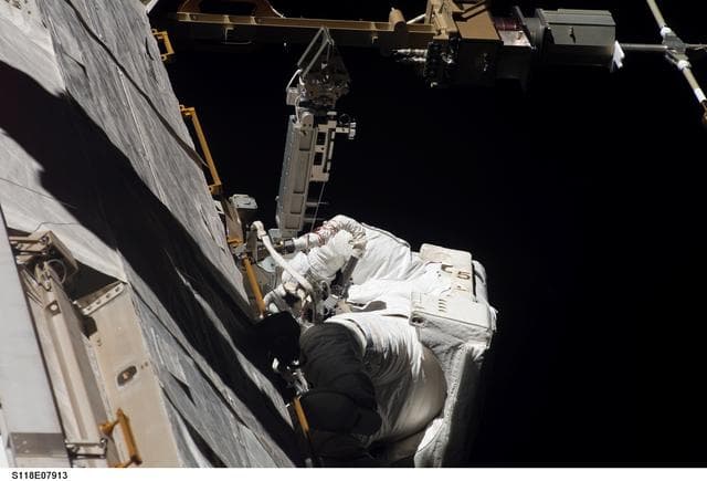 NASA image: View of Williams working on the OBSS Boom Stand during STS-118 / Expedition 15 EVA