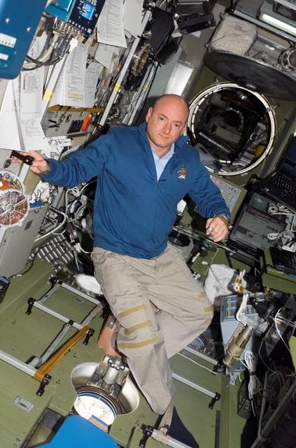 NASA image: View of Kelly posing for a photo in the SM during STS-118