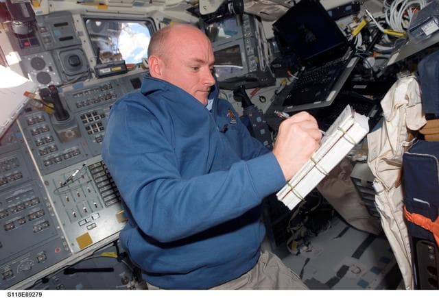 NASA image: View of CDR Kelly working in the FD of the Shuttle Endeavour during STS-118
