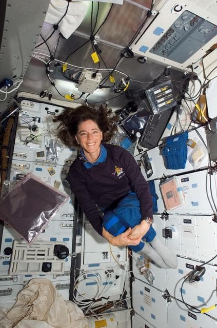 NASA image: View of STS-118 MS Morgan posing with Basil Seeds in the MDDK of the Shuttle Endeavour