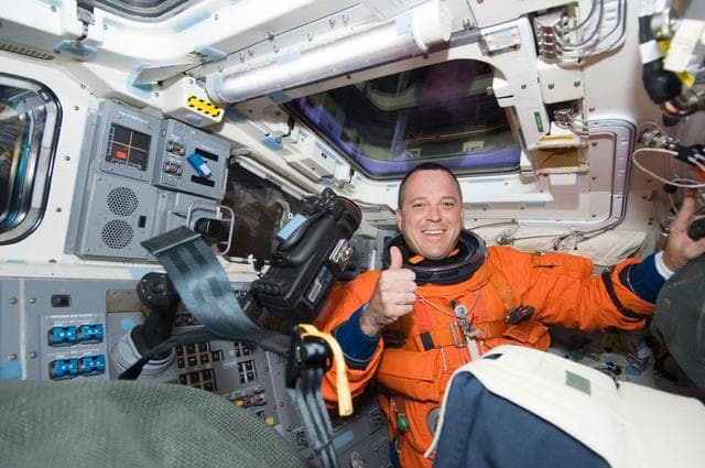 NASA image: Arnold on Discovery Flightdeck (FD)