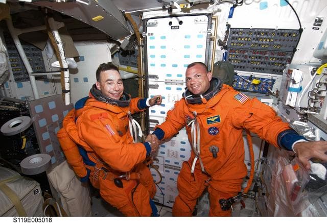 NASA image: Archambault and Antonelli on Discovery Middeck (MDDK)
