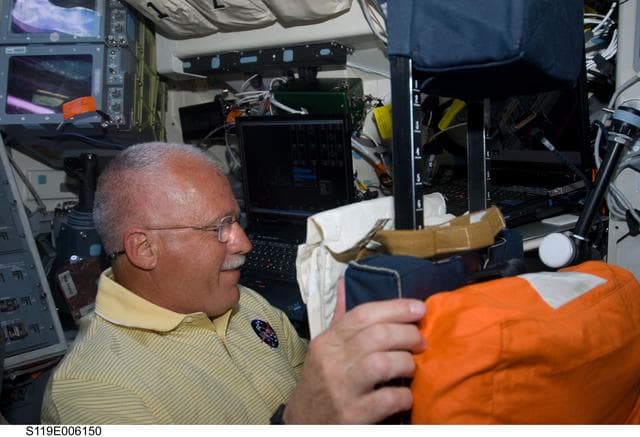 NASA image: Phillips on AFT Flight Deck (FD)