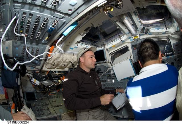 NASA image: Archambault and Wakata on Flight Deck (FD)