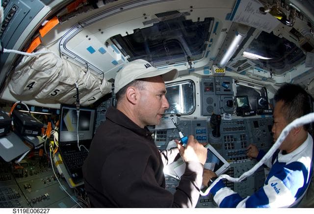 NASA image: Archambault and Wakata on AFT Flight Deck (FD)