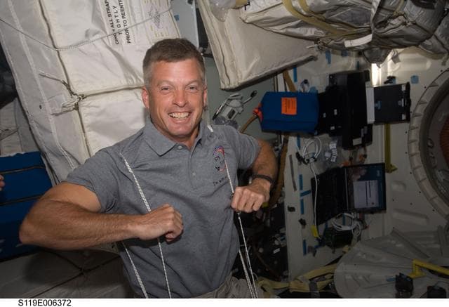 Crew Exercise on Shuttle Discovery