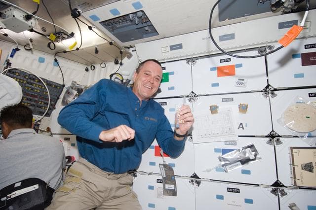 NASA image: Arnold on Middeck (MDDK) with Food