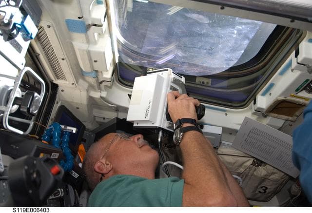 NASA image: Phillips on Flight Deck (FD) during Rendezvous (RNDZ) with ISS