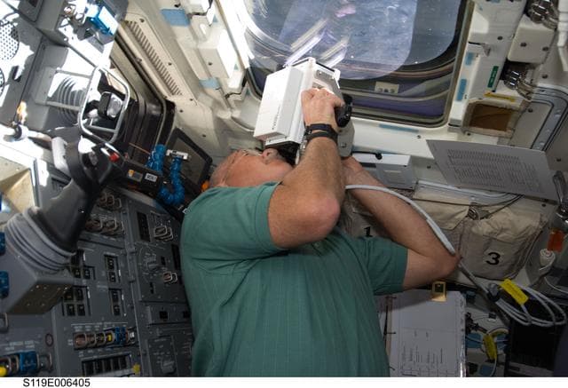 NASA image: Phillips on Flight Deck (FD) during Rendezvous (RNDZ) with ISS