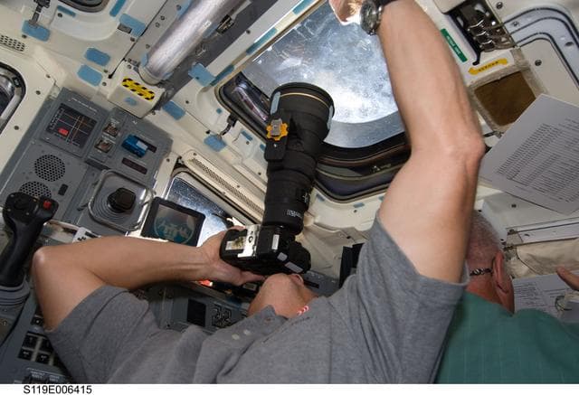 NASA image: Phillips and Swanson on Flight Deck (FD) during Rendezvous (RNDZ) with ISS