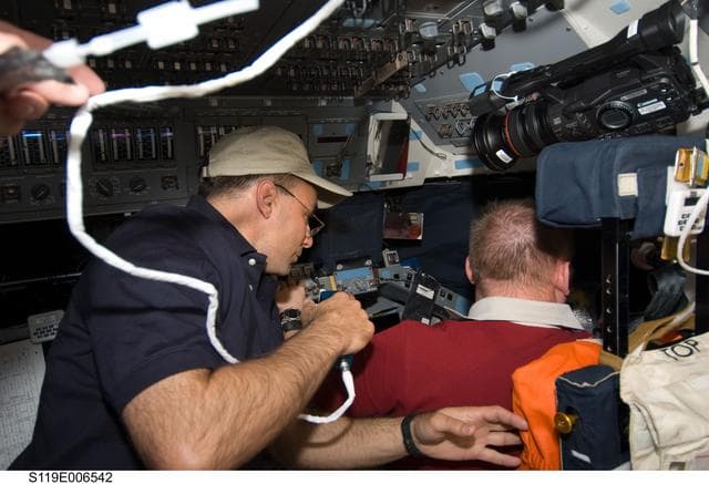 NASA image: Archambault and Fincke on Flight Deck (FD)