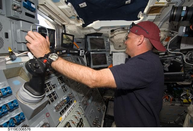 NASA image: Antonelli uses remote manipulator system (RMS) at AFT Flight Deck (FD)
