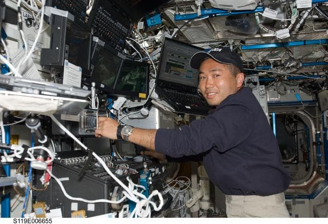 NASA image: Wakata at Robotics Workstation (RWS) in support of STS-119 EVA 1