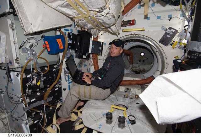 NASA image: Swanson at Laptop on Middeck (MDDK)