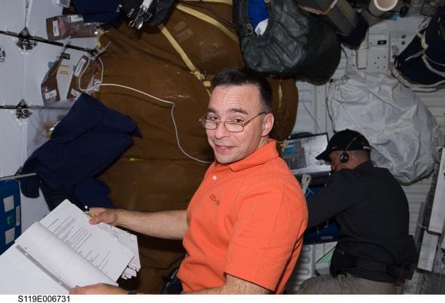 NASA image: Archambault on Middeck (MDDK) during transfer OPS