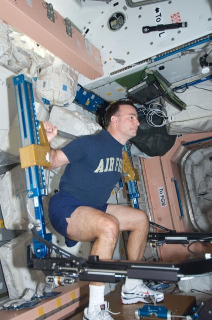 NASA image: Archambault uses Advanced Resistive Exercise Device (ARED)
