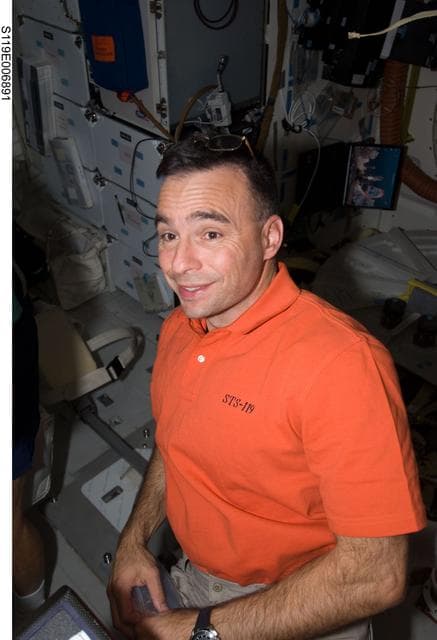 NASA image: Archambault and Phillips on Discovery Middeck (MDDK)