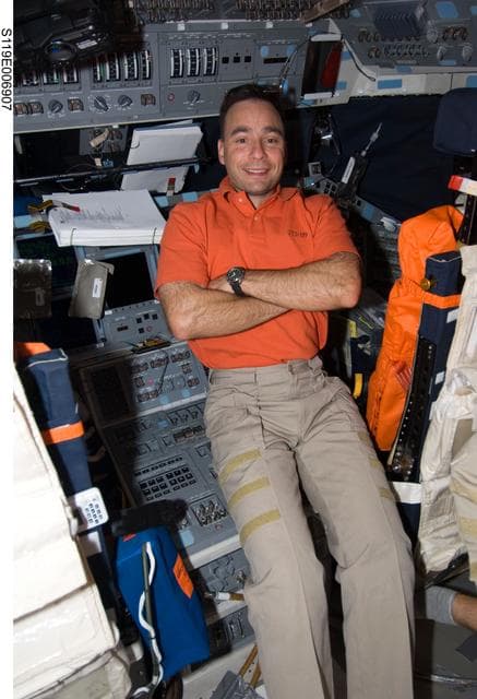 NASA image: Archambault poses for photo on Flight Deck (FD)