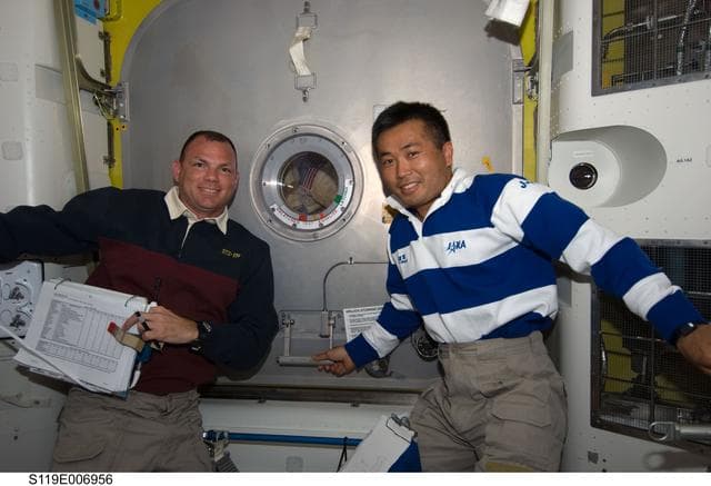 NASA image: Antonelli and Wakata at hatch of Crew Lock