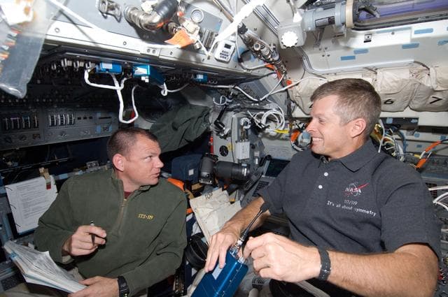 NASA image: Antonelli and Swanson review undocking procedures on Flight Deck