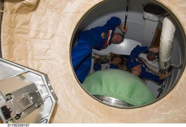 NASA image: Crew in Shuttle Airlock conduct Undocking Prep
