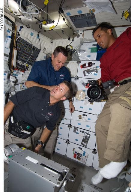 NASA image: Arnold, Swanson, and Acaba on Middeck (MDDK)