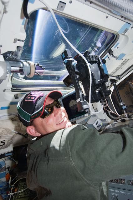 NASA image: Antonelli at Window with camera during ISS Flyaround