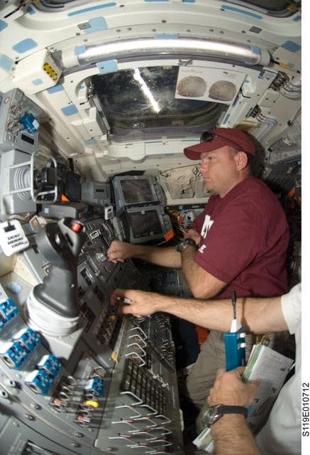 NASA image: Antonelli on AFT flight deck (FD) for OBSS OPS
