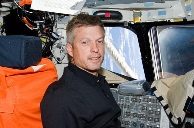 NASA image: Swanson seated on Flight Deck (FD)