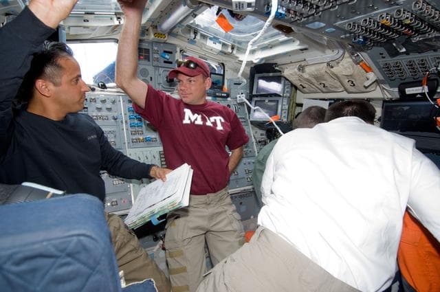 NASA image: Acaba and Antonelli on Flight Deck (FD) during OBSS Late Inspection OPS