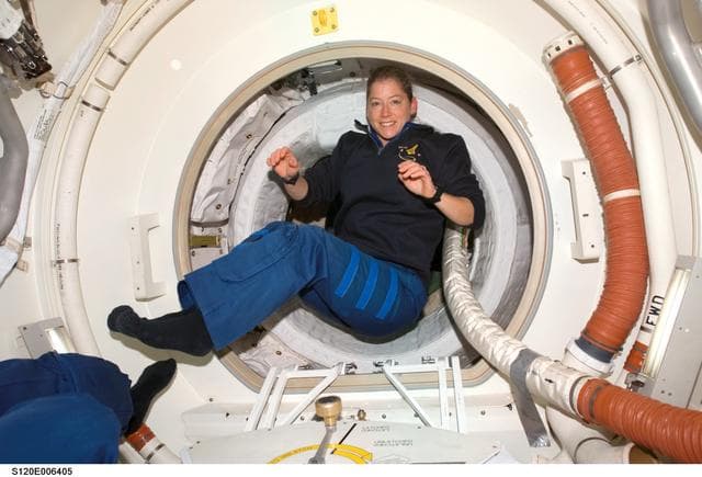 NASA image: Melroy in the  Orbiter Docking Compartment (ODC)