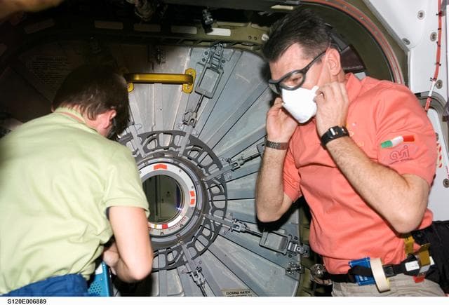 NASA image: Whitson and Nespoli prepare to open Node 2 hatch