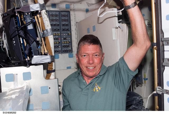 NASA image: Fossum poses for a picture in the MDK during STS-121