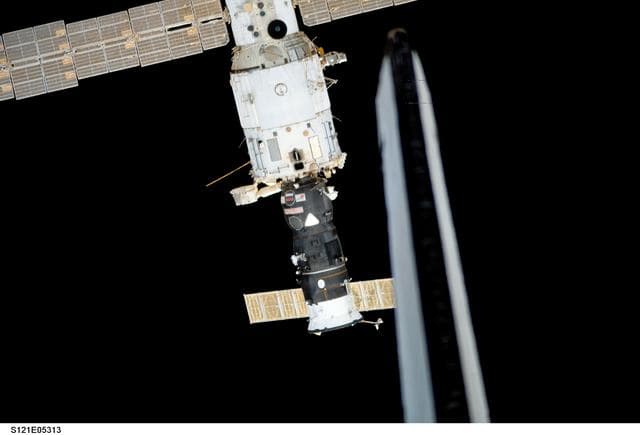 NASA image: Nadir view of the SM as the orbiter Discovery closes in to dock with the ISS during STS-121