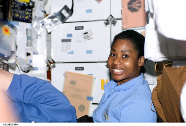 NASA image: Wilson, smiles at the camera in the MDK during STS-121