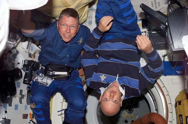 NASA image: Kelly and Fossum in the orbiter MDK during STS-121