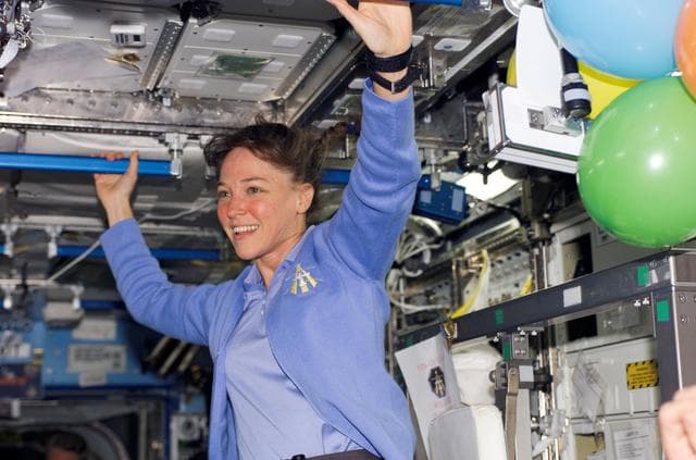 NASA image: Nowak smiles after ingressing the U.S. Lab during STS-121/Exp. 13 joint OPS