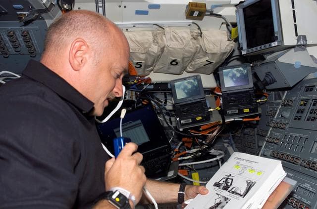 NASA image: Kelly talks with mission control on the AFD during STS-121