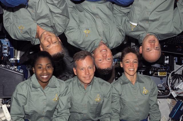 NASA image: STS-121 group photo taken during STS-121 / Expedition 13 joint operations