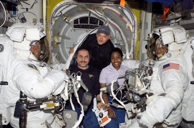 NASA image: Group photo of Exp. 13 and STS-121 crew members during EVA2 prep on STS-121 / Expedition 13 joint operations
